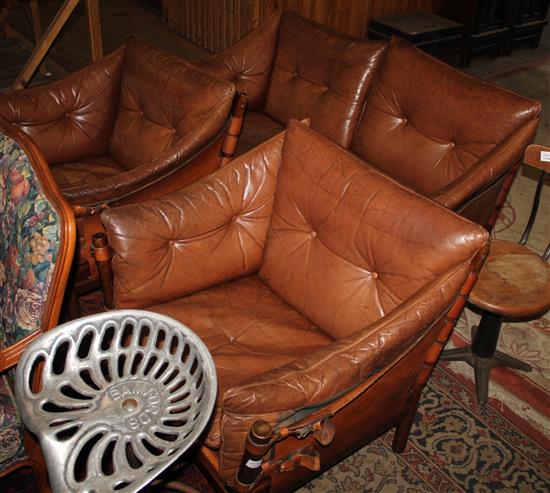 A Danish leather three piece suite